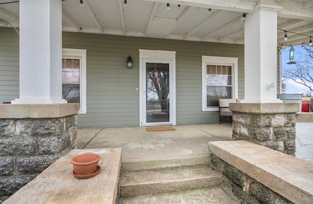 property entrance with a porch