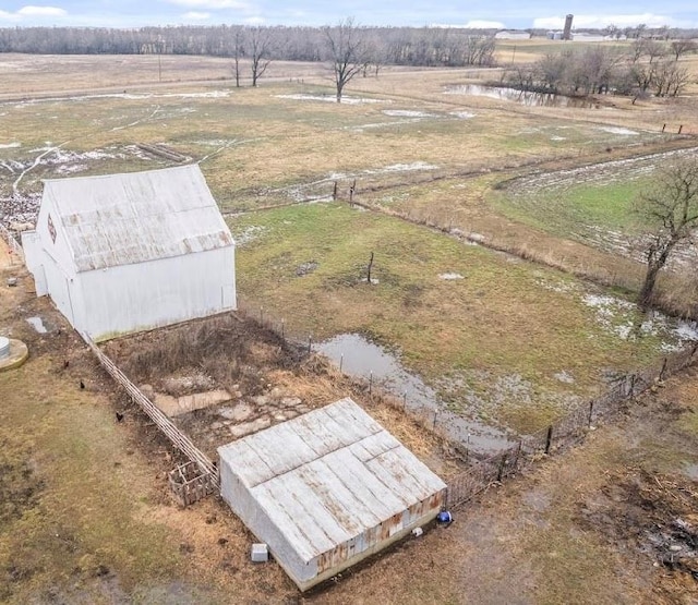 birds eye view of property with a rural view