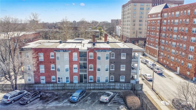 view of property with uncovered parking