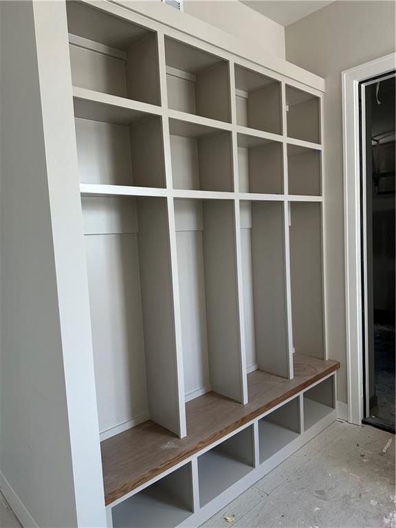 17321 Bluejacket St, Overland Park, KS 66221 - mudroom featuring baseboards