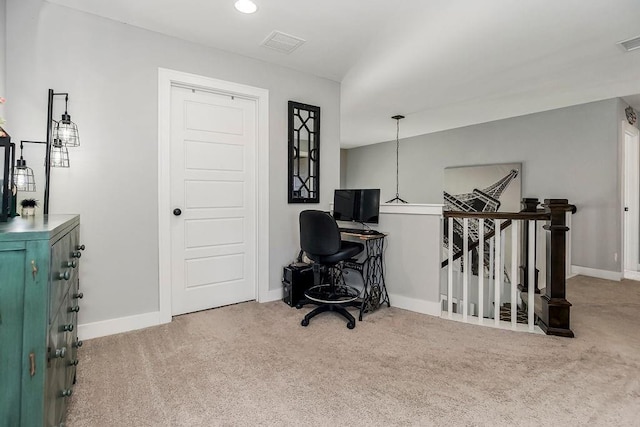 office space with baseboards, visible vents, and carpet floors