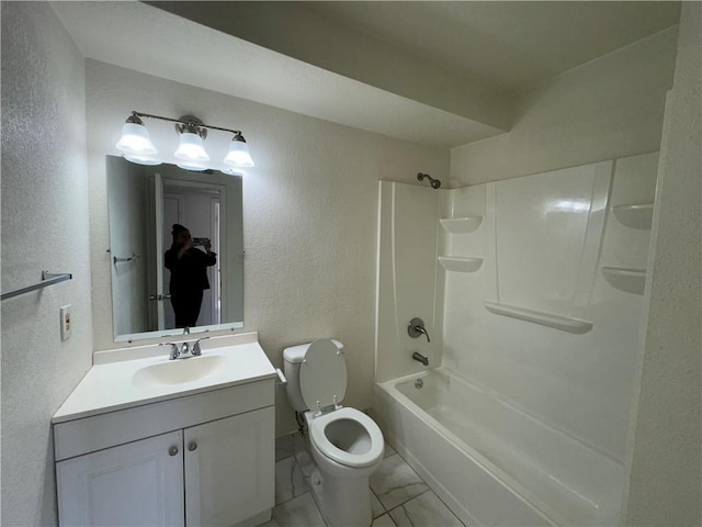 3112 Benton Blvd, Kansas City, MO 64128 - full bath with a textured wall, toilet, marble finish floor, tub / shower combination, and vanity