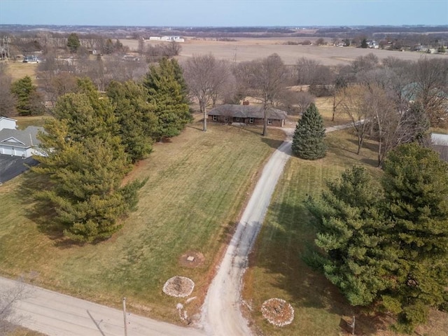 birds eye view of property featuring a rural view