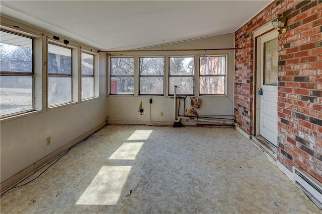 unfurnished sunroom featuring lofted ceiling, a healthy amount of sunlight, and baseboard heating