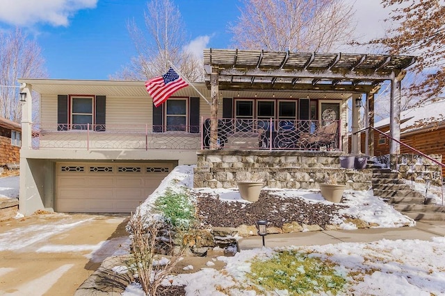 view of front of property with a garage and stairway