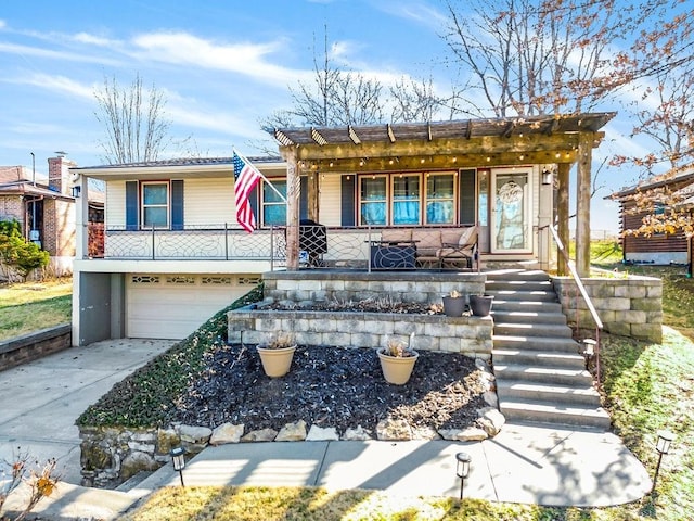 ranch-style home with a porch, concrete driveway, and a garage