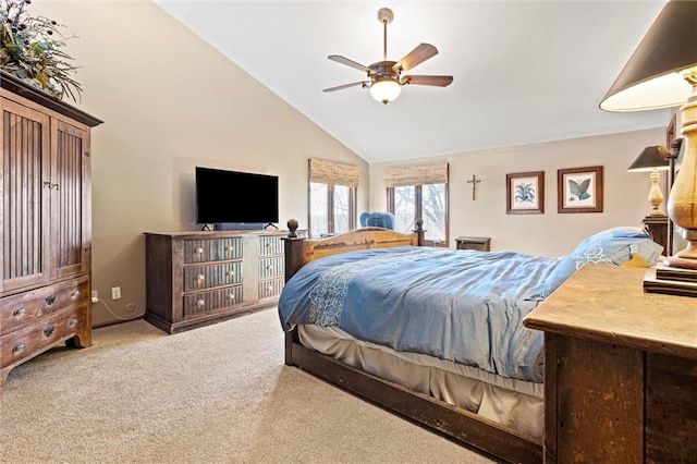 bedroom featuring carpet, ceiling fan, and high vaulted ceiling