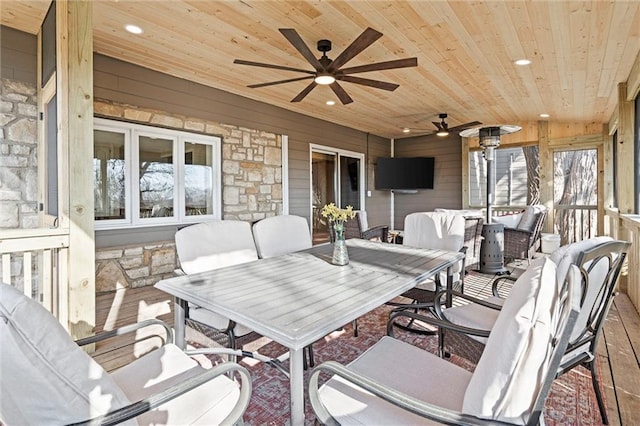 view of patio / terrace with outdoor dining area and a ceiling fan