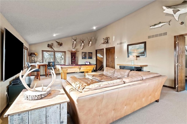 living room featuring a textured ceiling, billiards, visible vents, and light carpet