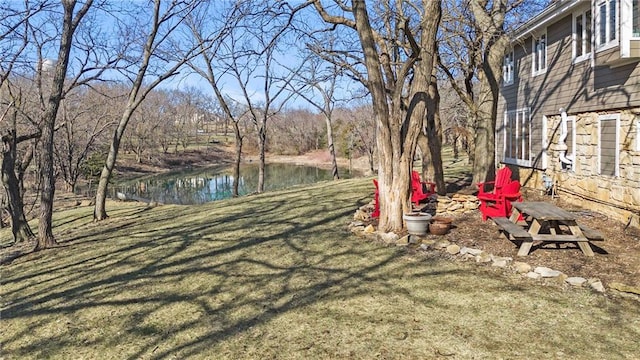 view of yard with a water view