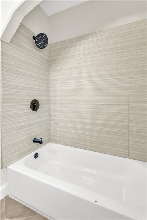 1122 E 76th St, Kansas City, MO 64131 - full bathroom with bathtub / shower combination and tile patterned floors