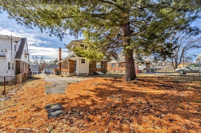 1122 E 76th St, Kansas City, MO 64131 - view of yard featuring fence