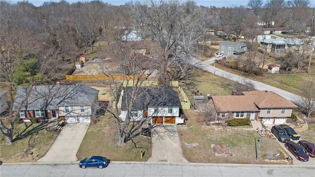 birds eye view of property with a residential view