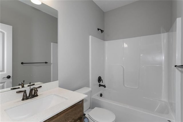 full bath with toilet, shower / bathing tub combination, and vanity