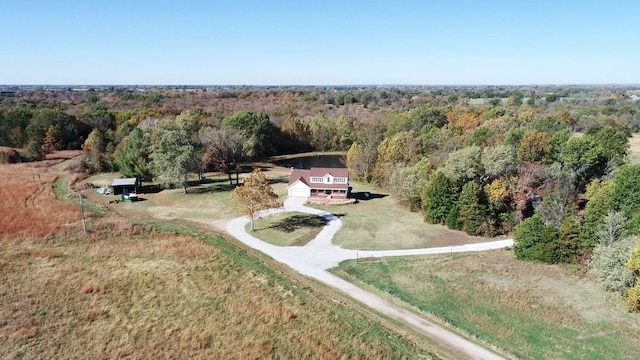 bird's eye view featuring a view of trees