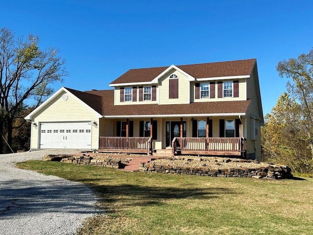 view of front of property featuring driveway, a shingled roof, an attached garage, covered porch, and a front lawn