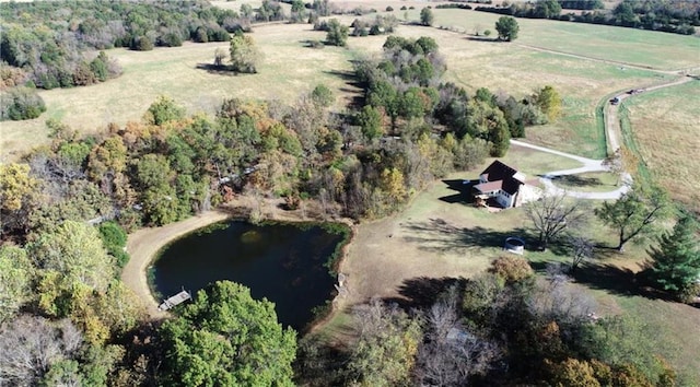 aerial view featuring a rural view and a water view