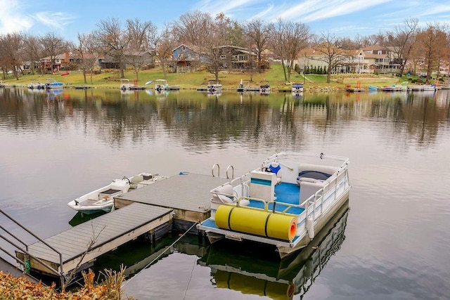 dock area featuring a water view