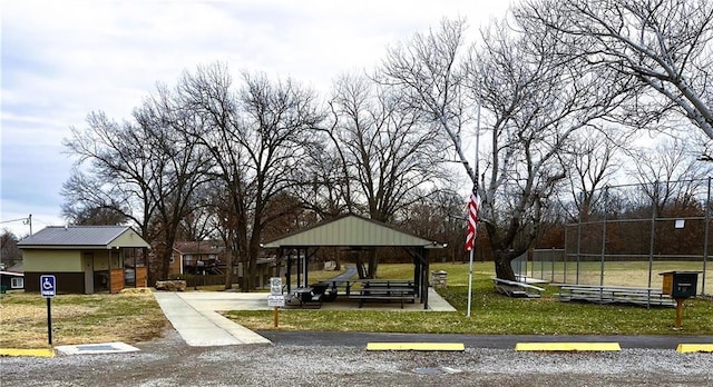 view of home's community with a yard and a gazebo