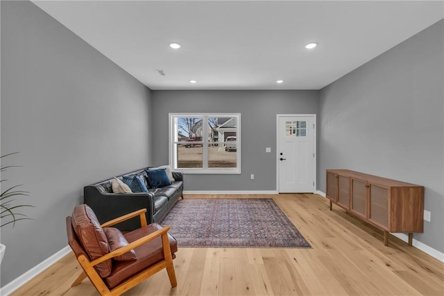 interior space with recessed lighting, light wood-style floors, and baseboards