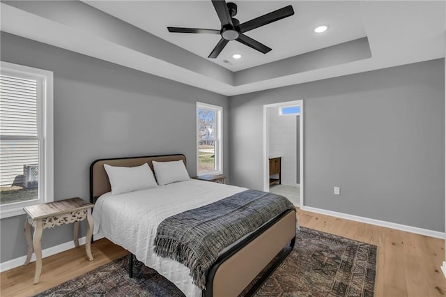 bedroom with recessed lighting, baseboards, light wood-type flooring, and ceiling fan