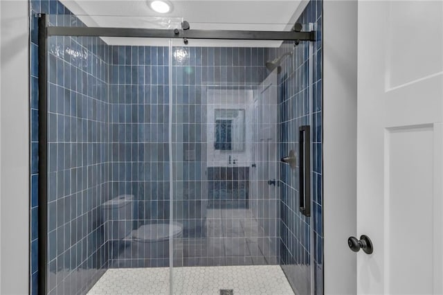 bathroom with a stall shower