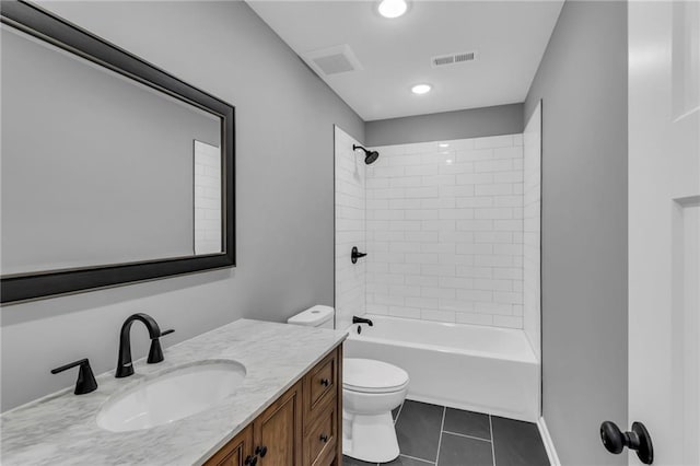 full bathroom with tile patterned flooring, visible vents, toilet, shower / bath combination, and vanity