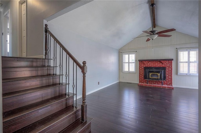 unfurnished living room featuring vaulted ceiling with beams, stairway, dark wood finished floors, and a ceiling fan