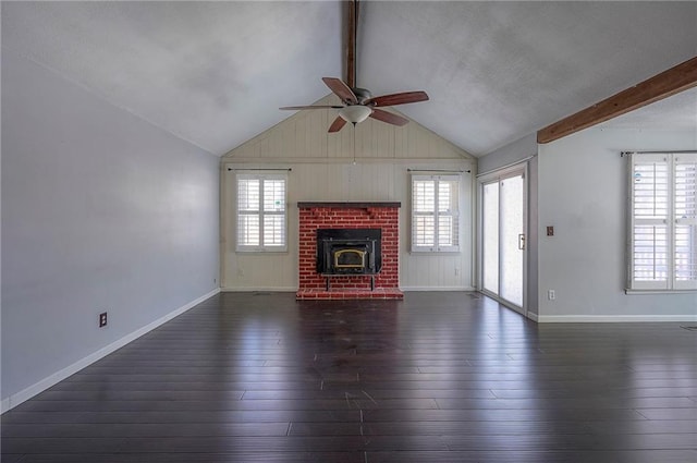 unfurnished living room featuring dark wood-style flooring, lofted ceiling with beams, and baseboards