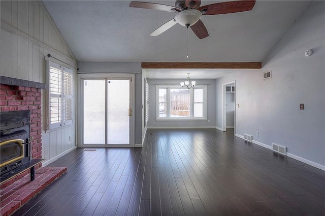 unfurnished living room with lofted ceiling, dark wood finished floors, and visible vents