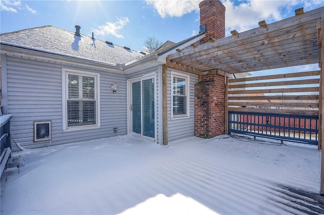 wooden deck featuring a pergola