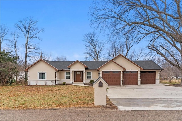 single story home featuring a front yard, concrete driveway, an attached garage, and stucco siding