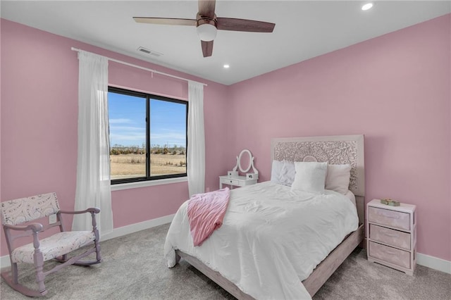 carpeted bedroom with a ceiling fan, recessed lighting, baseboards, and visible vents