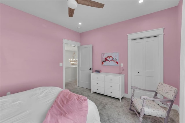 carpeted bedroom with recessed lighting, a closet, baseboards, and ceiling fan