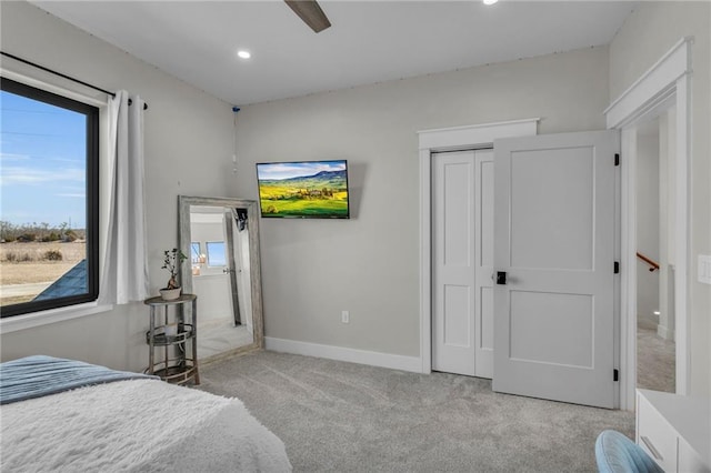 carpeted bedroom featuring recessed lighting, baseboards, a closet, and ceiling fan