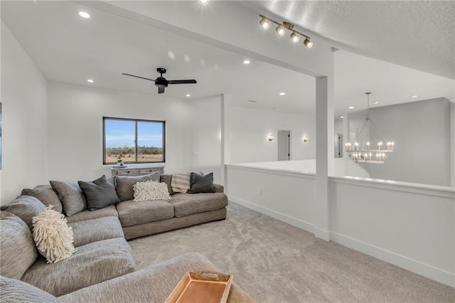 carpeted living area with ceiling fan with notable chandelier, recessed lighting, a textured ceiling, and baseboards