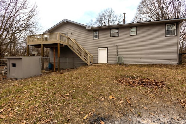 back of house with stairs, a deck, and cooling unit