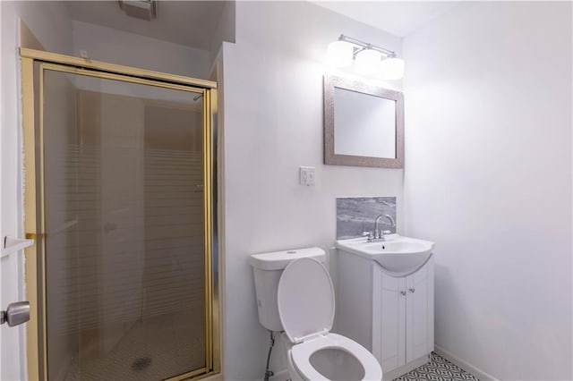 full bathroom with a stall shower, baseboards, visible vents, toilet, and vanity