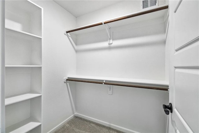 walk in closet with carpet flooring and visible vents