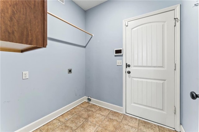 washroom featuring laundry area, electric dryer hookup, and baseboards