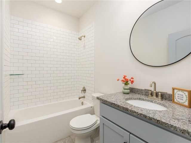 full bath with tub / shower combination, toilet, and vanity