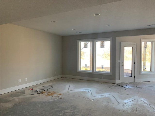 spare room with visible vents and baseboards