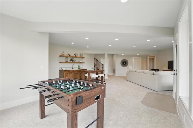 1510 NW 106th Ter, Kansas City, MO 64155 - game room with light colored carpet, recessed lighting, wet bar, and baseboards