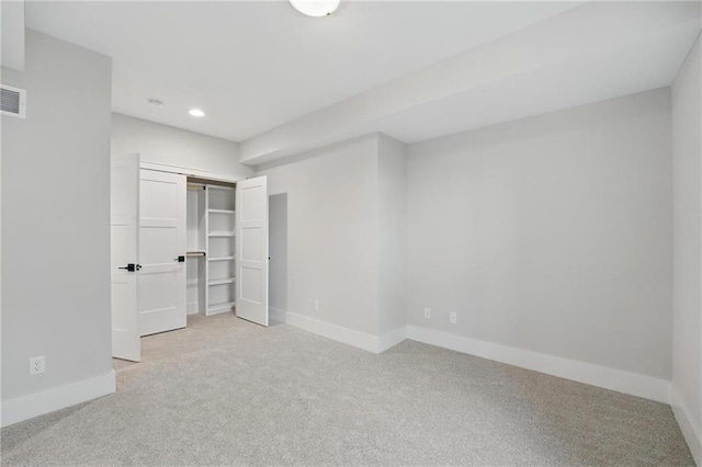 1510 NW 106th Ter, Kansas City, MO 64155 - unfurnished bedroom with baseboards, recessed lighting, a closet, and light carpet