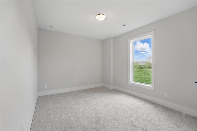 1510 NW 106th Ter, Kansas City, MO 64155 - carpeted spare room with baseboards and visible vents