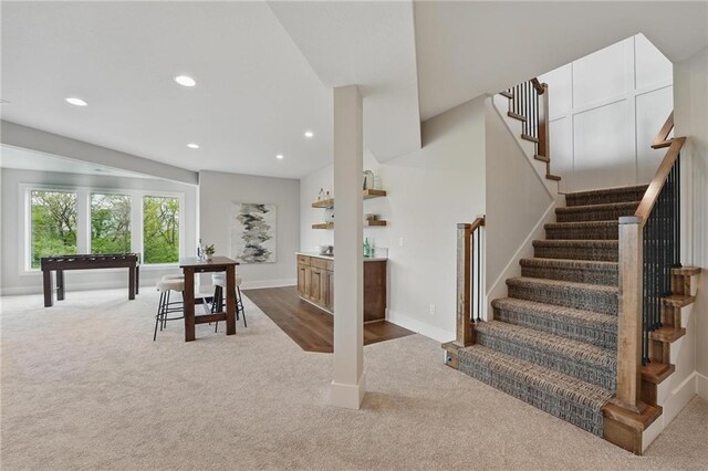 1510 NW 106th Ter, Kansas City, MO 64155 - stairs with carpet floors, baseboards, and recessed lighting