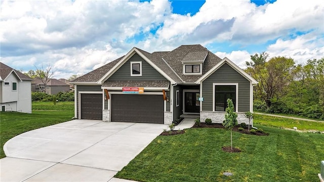 1510 NW 106th Ter, Kansas City, MO 64155 - craftsman inspired home with roof with shingles, a garage, a front lawn, concrete driveway, and stone siding