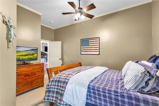 bedroom featuring ceiling fan, carpet, and ornamental molding