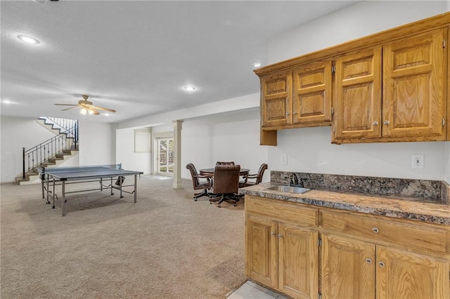 game room featuring recessed lighting, light colored carpet, a ceiling fan, and a sink