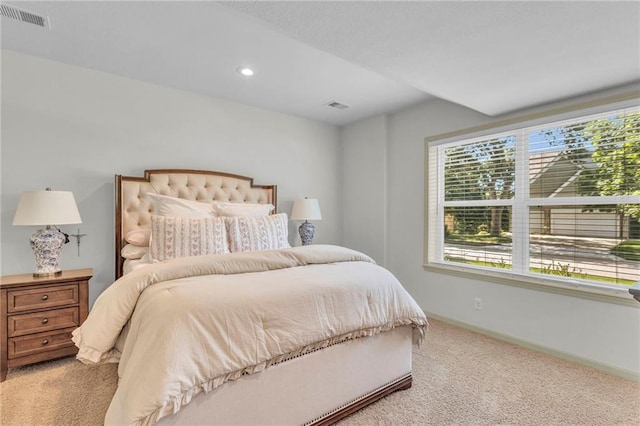 bedroom featuring recessed lighting, baseboards, visible vents, and light carpet